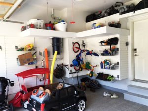 2-car-garage-north-toronto-overhead-platform-slatwall-organization-system-hooks-baskets-polyaspartic-garage-floor-coating-central-vacuum-left-side-after