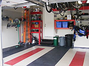 2 car garage, stouffville, left rear door, pvc floor tiles, punched aluminum baseboard, slatwall, custom overhead platform, shelves, bike rack, bicycle storage