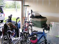 2 car garage, stouffville, rear right, custom finish overhead garage platform, overhead pulley bicycle storage, sports rack, garbage recycle bin