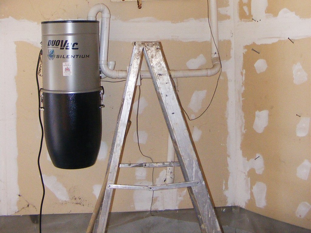 1.5 car garage, etobicoke - overhead platform storage, garage cabinets, slatwall organization system, camlock camlok hooks, polyaspartic floor, cement block coating - before