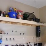 custom overhead storage, rear wall secured with airplane cables