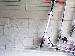 treating cement block garage walls & cement garage floors - before