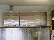 1 car garage, markham - hercke upper wall cabinets, punched aluminum wainscoting baseboard