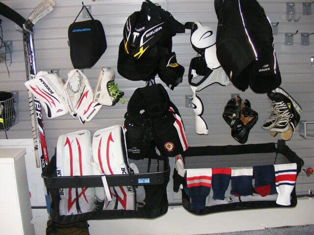 slatwall organization system camlock hooks baskets hockey winter sports storage