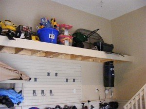 custom overhead storage, rear wall secured with airplane cables