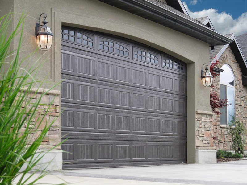 garage door brick stone home