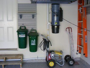 recycle bins near entrance to house interior where it is most accessible