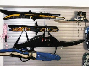 sports equipment storage - slatwall, camlock hooks, water skis, snowboards, snowshoes