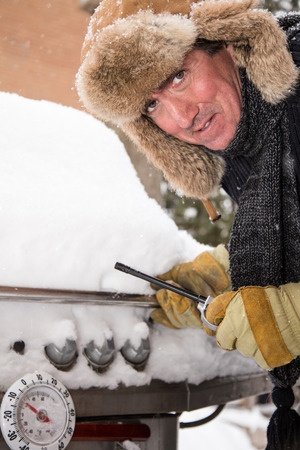 winter bbq outdoors backyard snow storm electrical outage